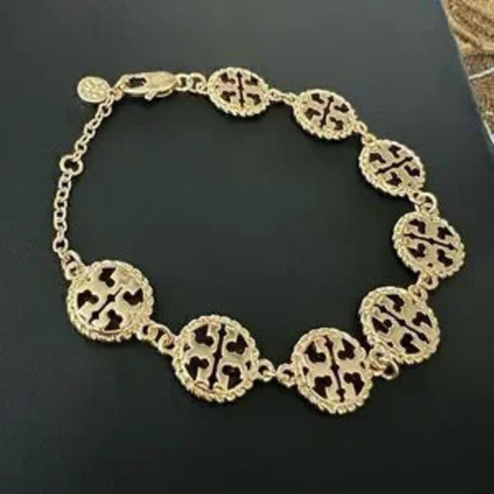 TORY BURCH Rope lined Disc bracelet